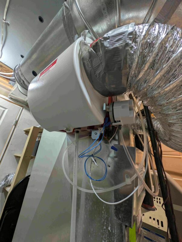 Old Honeywell humidifier before replacement Calgary.