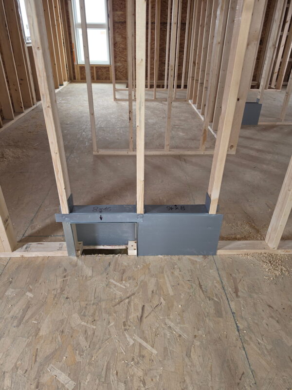 Custom HVAC ductwork installed within the wall framing for a new home addition in Calgary.