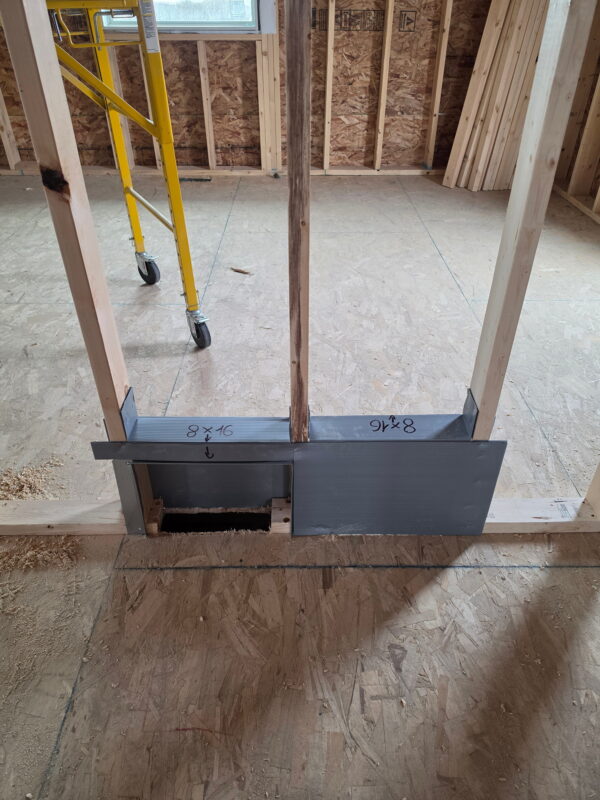 Sheet metal duct rough-in during the construction phase of a residential property.