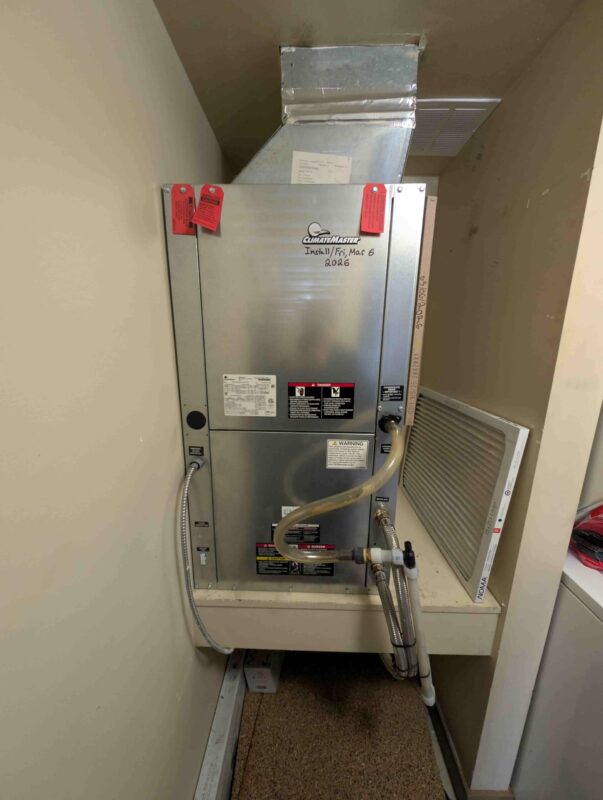 heat pump unit inside a residential utility